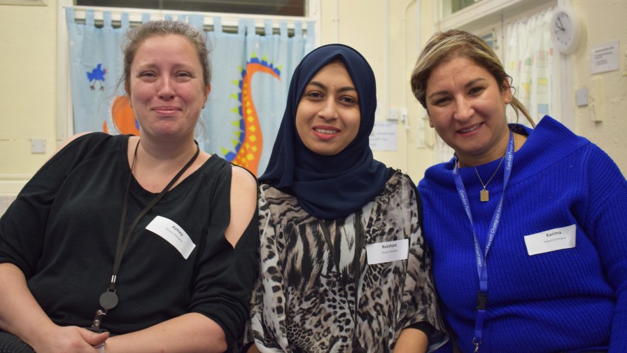 Three Parent Champions pose for a group photo