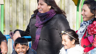 Parents with children in playground