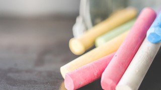 A bucket of chalk tipped to its side