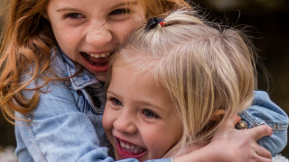 two girls hugging